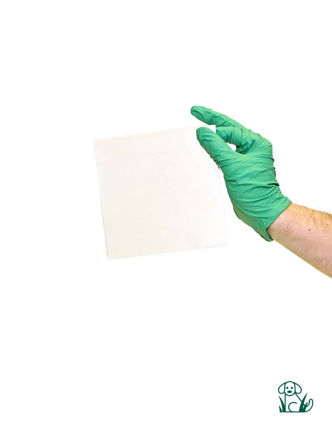 A hand wearing a green glove is holding a white cloth