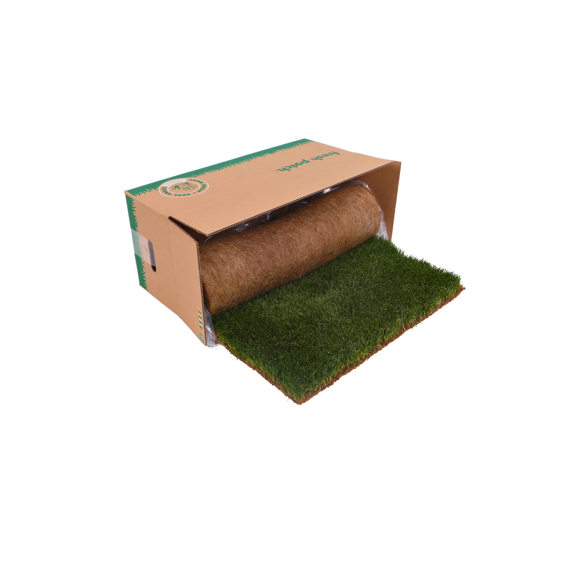 A cardboard box with a roll of real grass partially unrolled onto a white surface.