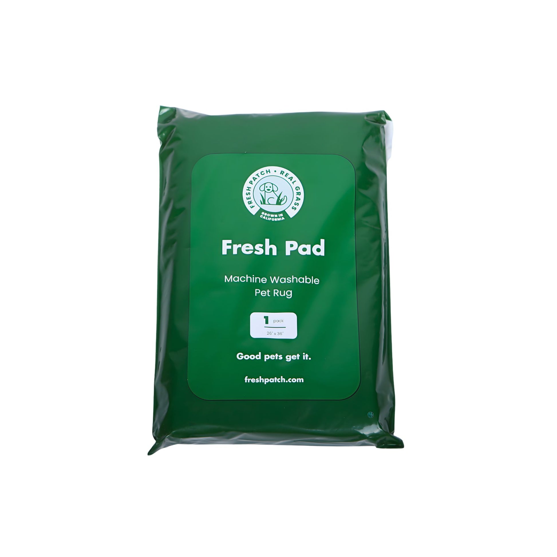 Green package of Fresh Pad machine washable pet rug on a white background