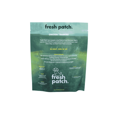 Green package of fresh patch chicken trainers on a white background